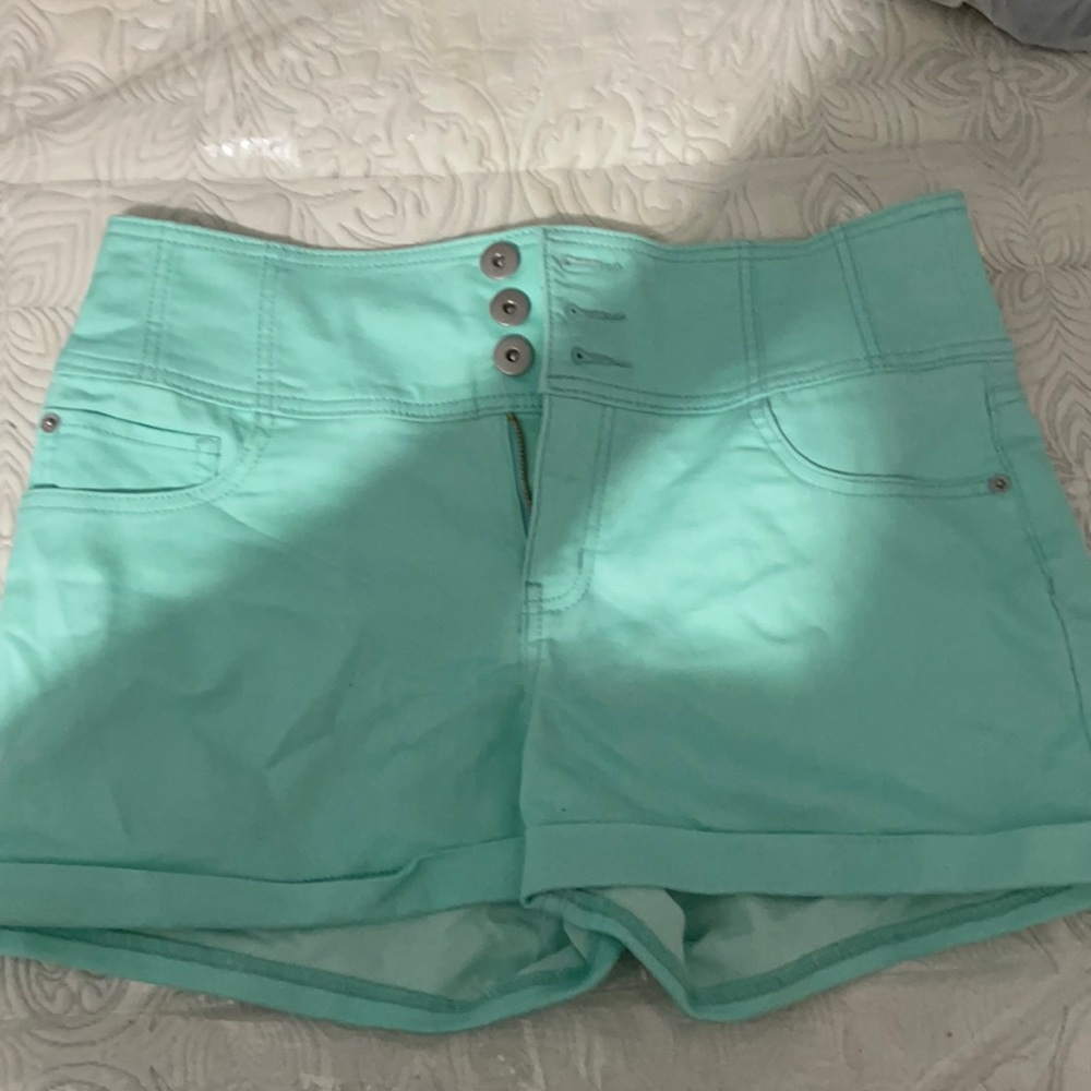 A light blue pair of high rise jean shorts!